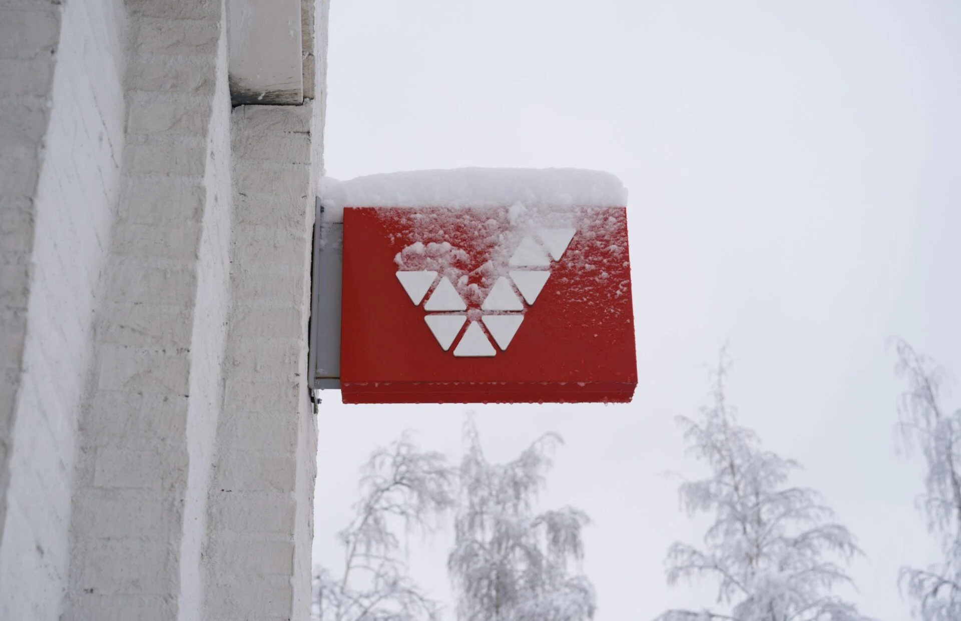 Veikkaus company sign covered in snow